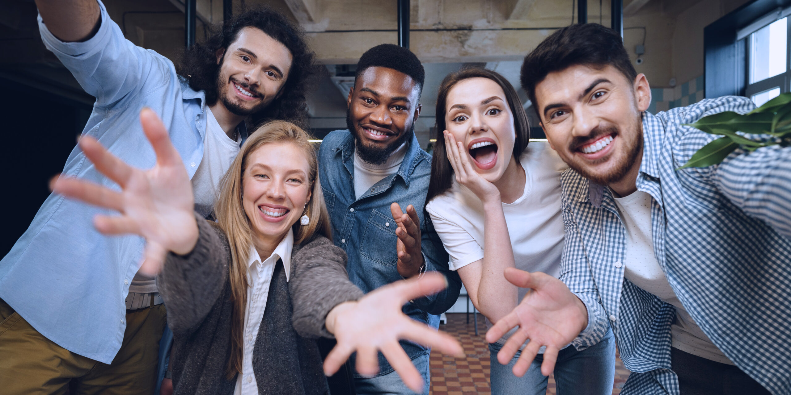 Happy overjoyed business team celebrate corporate victory